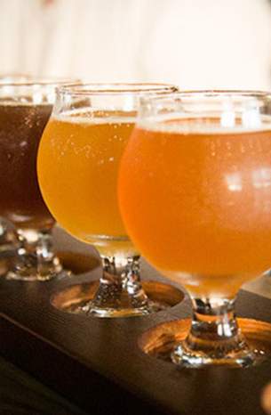Flight of five beers in tulip glasses from BrewLab Brewery + Kitchen in Downtown OP.