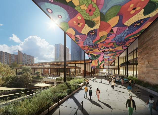 Austin Convention Center rendering shows the outdoor paseo looking towards a ballroom with pedestrians along the walkway in the foreground. The city skyline is in the back, and the paseo ceiling is covered with a mosaic along the length of the walkway