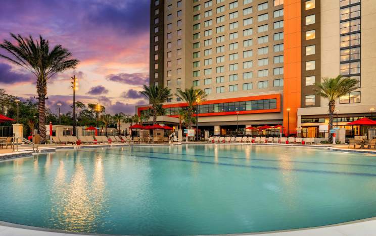 Pool at Drury Plaza Hotel Orlando at dusk