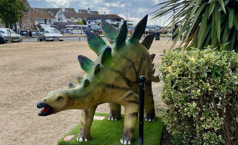Plastic Dinosaur on the beach
