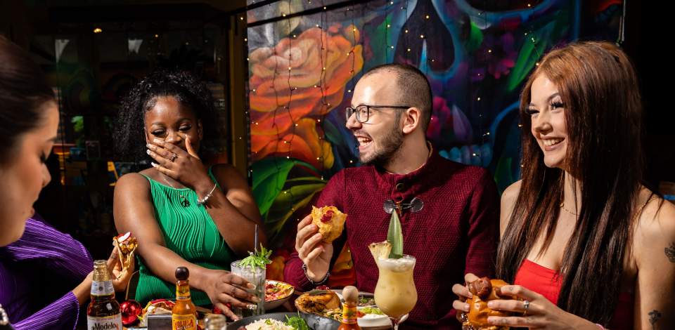Group enjoying a festive meal at Las Iguanas