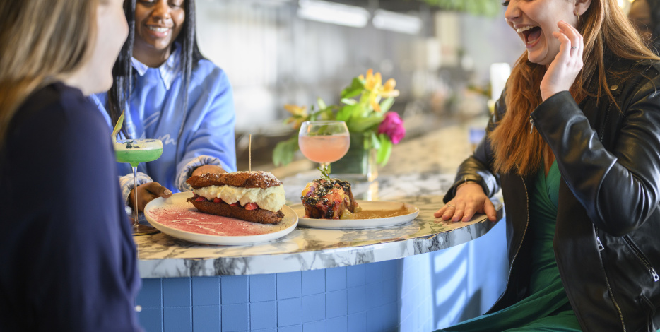 Group of Women enjoying food at Blume Restaurant in Greater Wilmington, Delaware