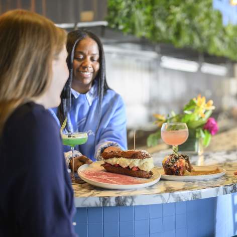 Group of Women enjoying food at Blume Restaurant in Greater Wilmington, Delaware