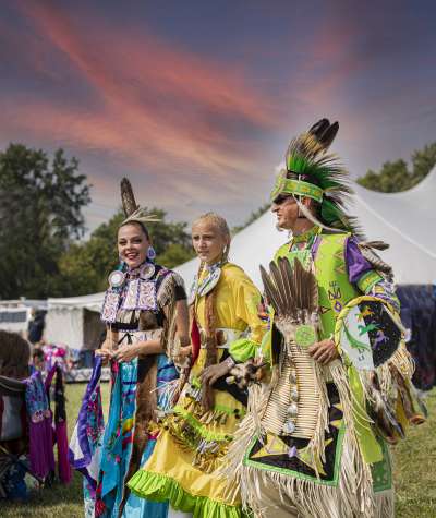People in Native American garb at the Andersontown Powwow in Madison County
