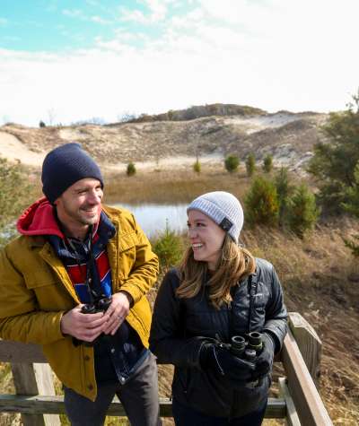 Couple bird watching at the Indiana Dunes in South Shore