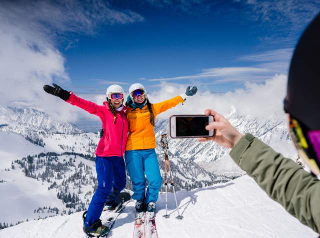 Friends at Snowbird taking a ski photo