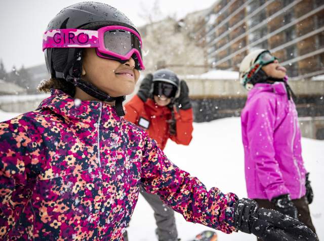 Kids taking snowboarding lessons at Snowbird's Mountain School