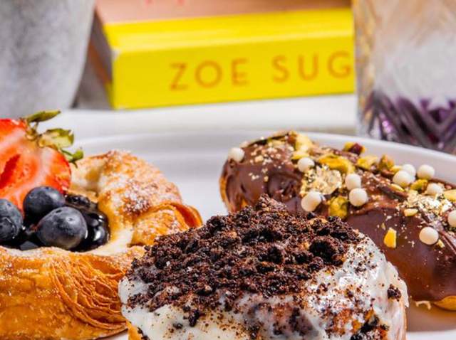Donuts with chocolate spread and cookie crumbles