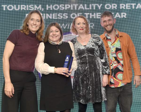 Danielle Dunfield presenting award to Ghost at the Feast | Chichester & District Business Awards 2025