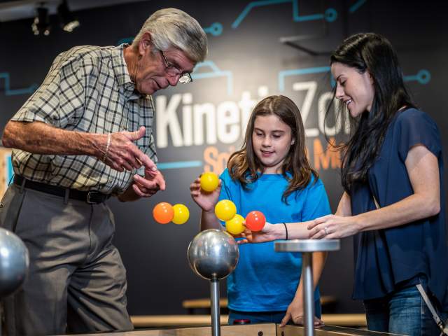 Orlando Science Center's Mini Maker Faire dad and girls
