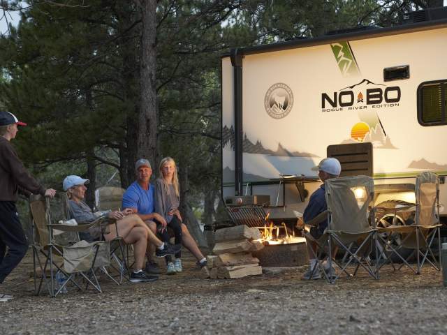 Sitting around the campfire while RV camping with the family at Glendo State Park.