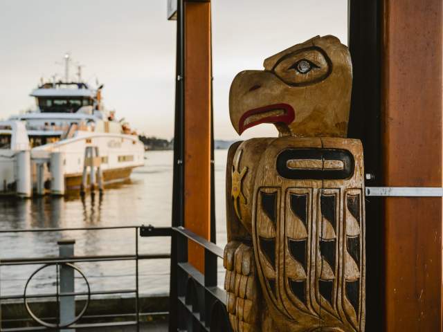 A view of a totem pole at the Westview Ferry Terminal.