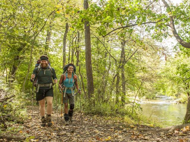 Couple with hiking gear along the Appalachian Trail