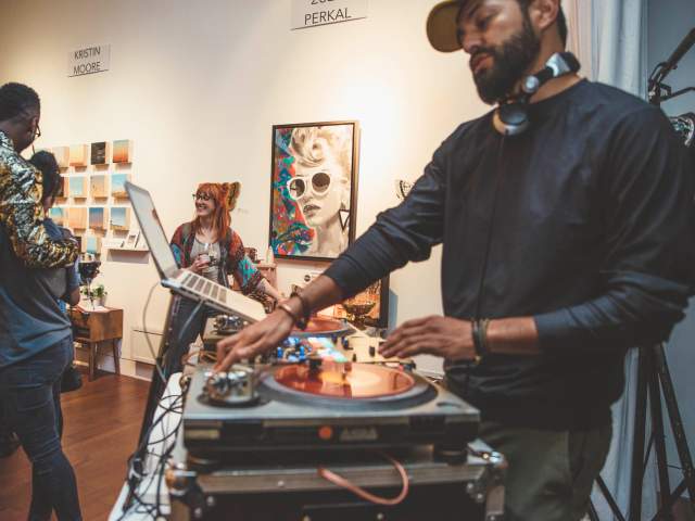 DJ and people attending event at The Cathedral in Austin Texas