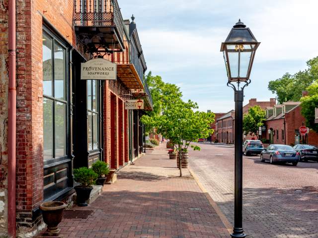 The road, sidewalks, and buildings are all made of brick in Historic Main Street in St. Charles, MO