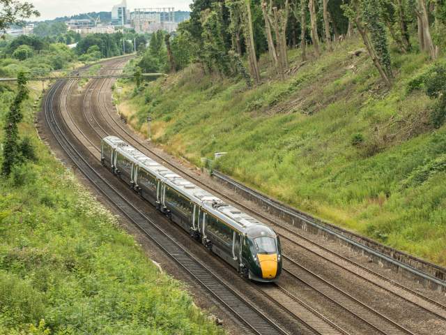 A GWR train travelling at speed on the train track - Credit Great Western Railway