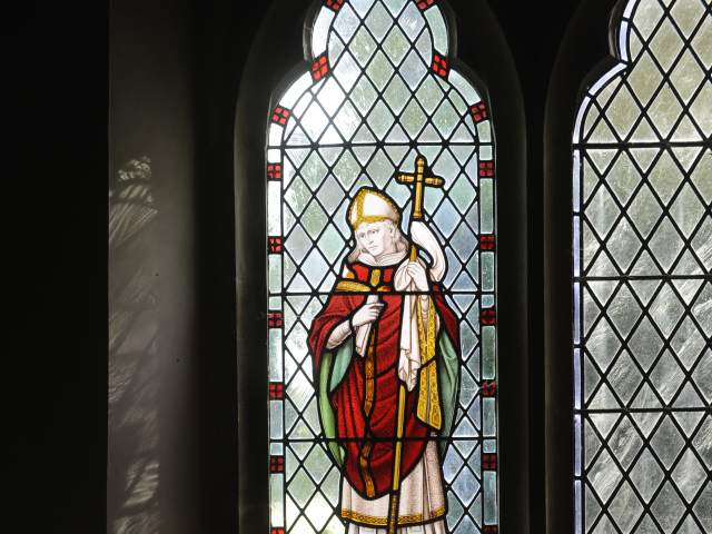 A stained glass window of Stephen Langton in a church