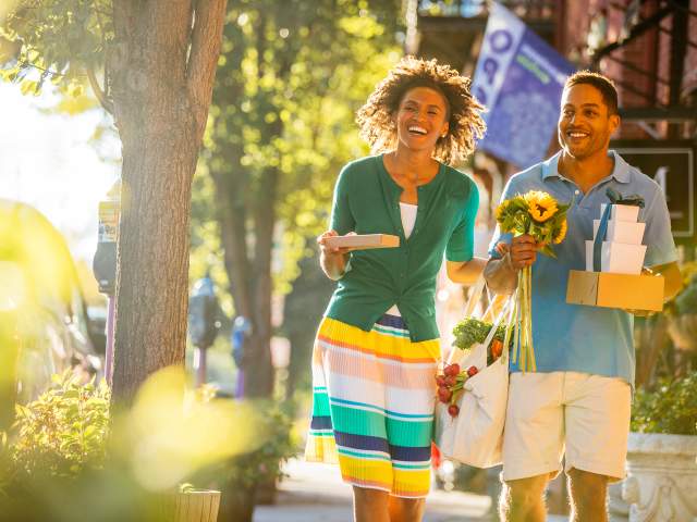 Couple walking downtown shopping
