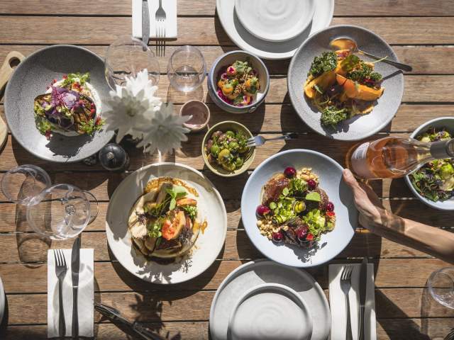 Top view of a selections of colourful lunch dishes