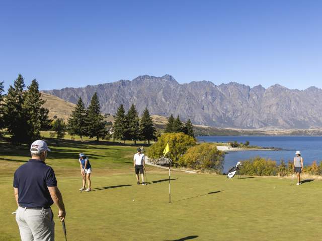 Group of friends playing at Queenstown Golf Club