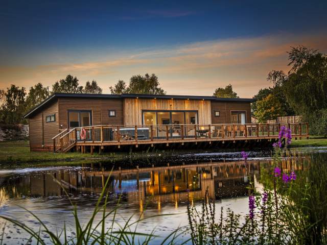 a lodge on the waterfront at night