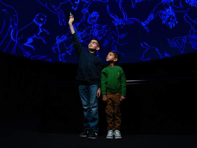 Children enjoying the planetarium at Science Central in Fort Wayne, Indiana.