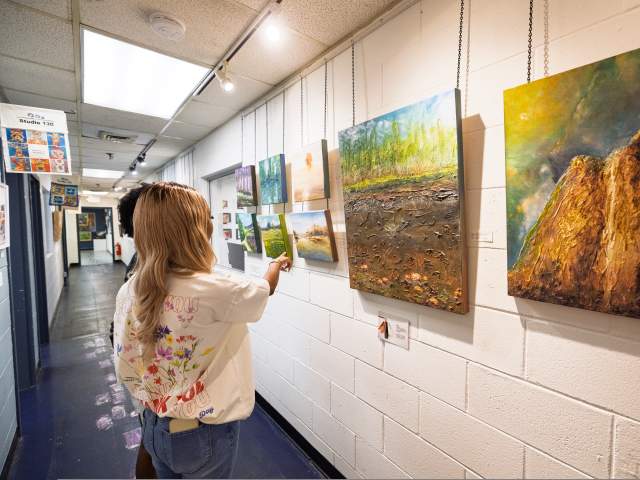 Women looking at art at Artworks