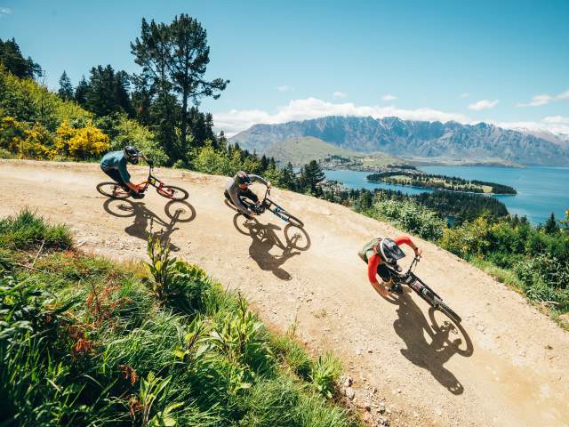 Three friends riding Skyline Queenstown Bike Park