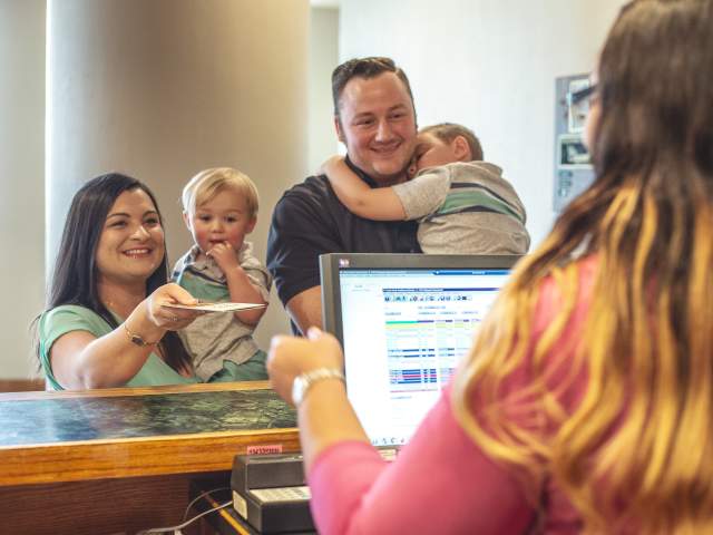 Family checking in at Beaumont Hotel