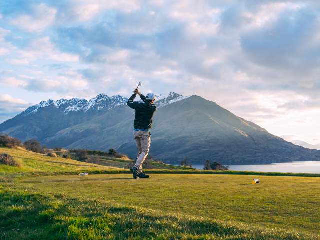 Man playing golf at Jack's Point in Spring
