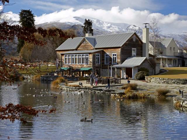 Family watching the ducks at Millbrook Resort in Winter