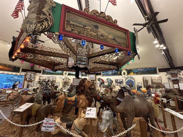 A variety of carved carousel animals.