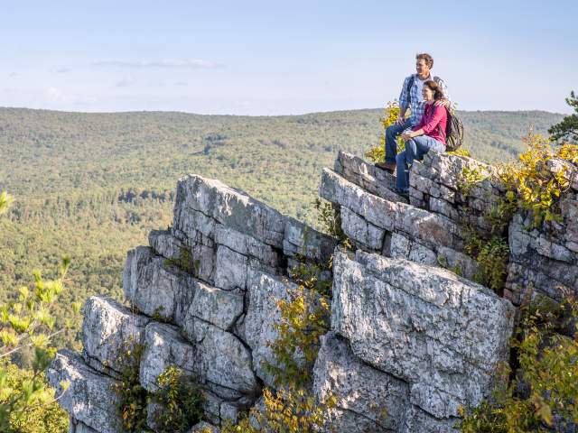 Couple looking out on the Pole Steeple Trail at Pine Grove Furnace State Park