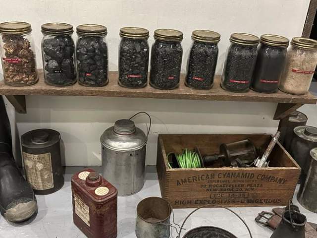 A display showing the various sizes of coal: nut, pea, buckwheat, rice, barley, number four and pulverized.