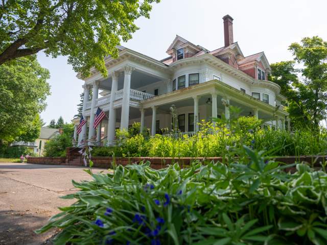 exterior side view of the laurium manor inn