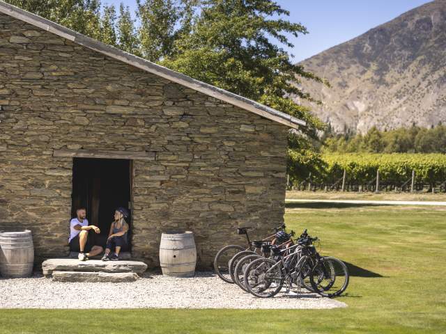 Couple touring Peregine Winery by bike