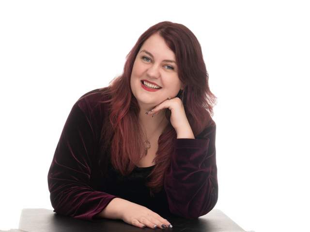 Headshot of Amy Savage.