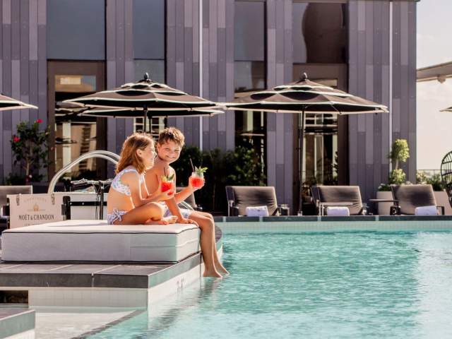 Kids Hanging Out at the Four Seasons New Orleans Pool