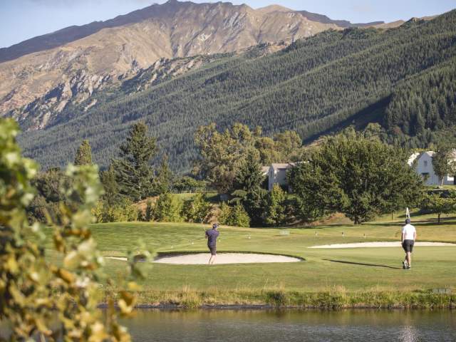 Friends playing golf at Millbrook Resort