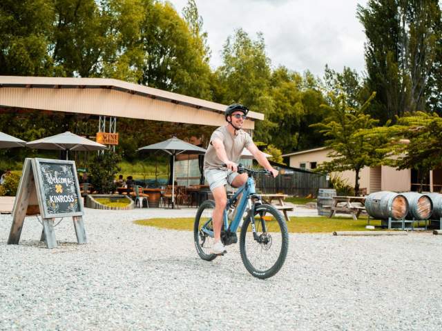Person on bike at Kinross Wines