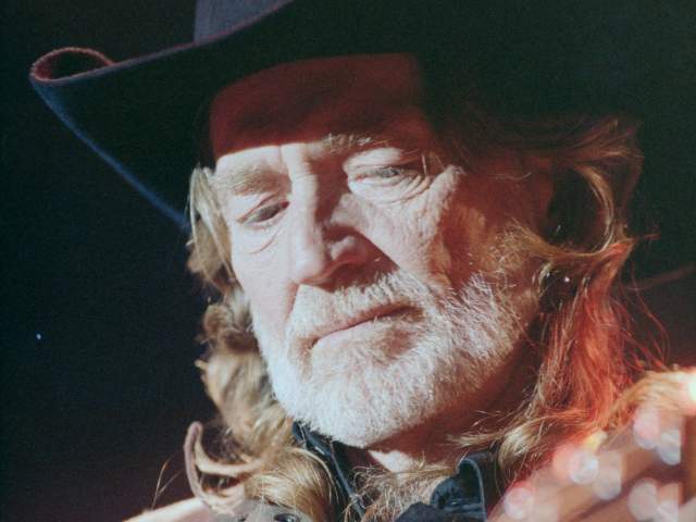 Willie Nelson plays guitar at SXSW