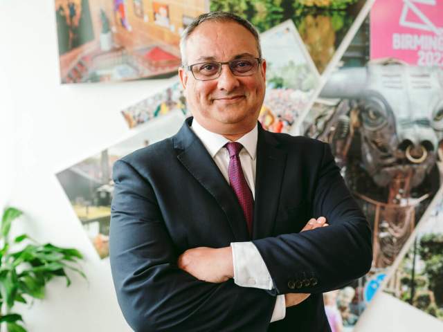 Neil Rami stood in front of images of the West Midlands