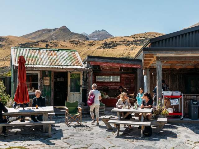 A group of people enjoying a beautiful day in Glenorchy at Mrs Wooly's General Store