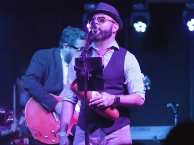 Grupo Fantasma band on stage in austin texas