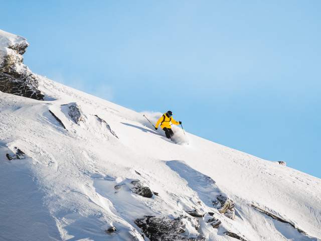 Blake Marshall Free Skiing at The Remarkables on a bluebird winters day