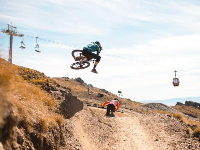 Mountain Biking does a jump at Cardrona Bike Park