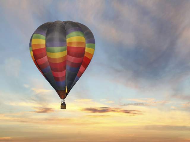 colorful hot air balloon in a sunrise sky