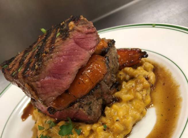beautifully plated meat serving