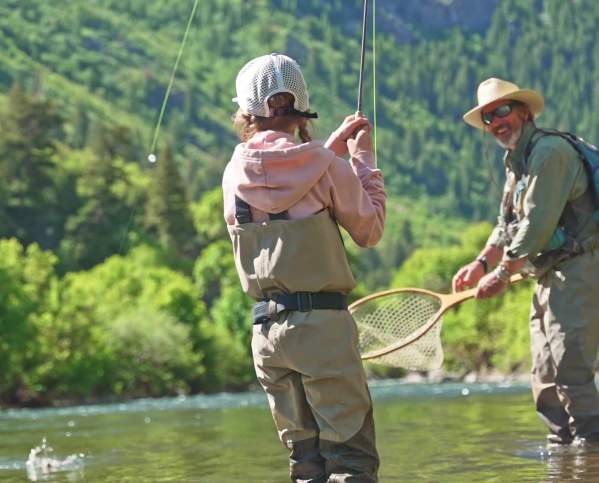 Little girl and man Fly Fishing on the Provo River