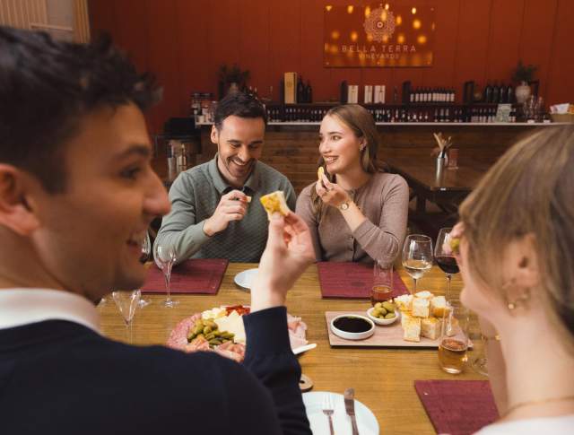 Friends eating at a winery